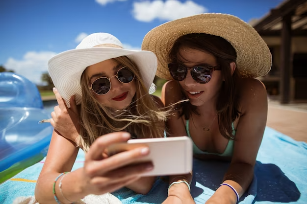 women-taking-selfie-mobile-phone-while-sunbathing_107420-96105.avif women-taking-selfie-mobile-phone-while-sunbathing_107420-96105.avif